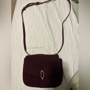 Fuzzy maroon purse